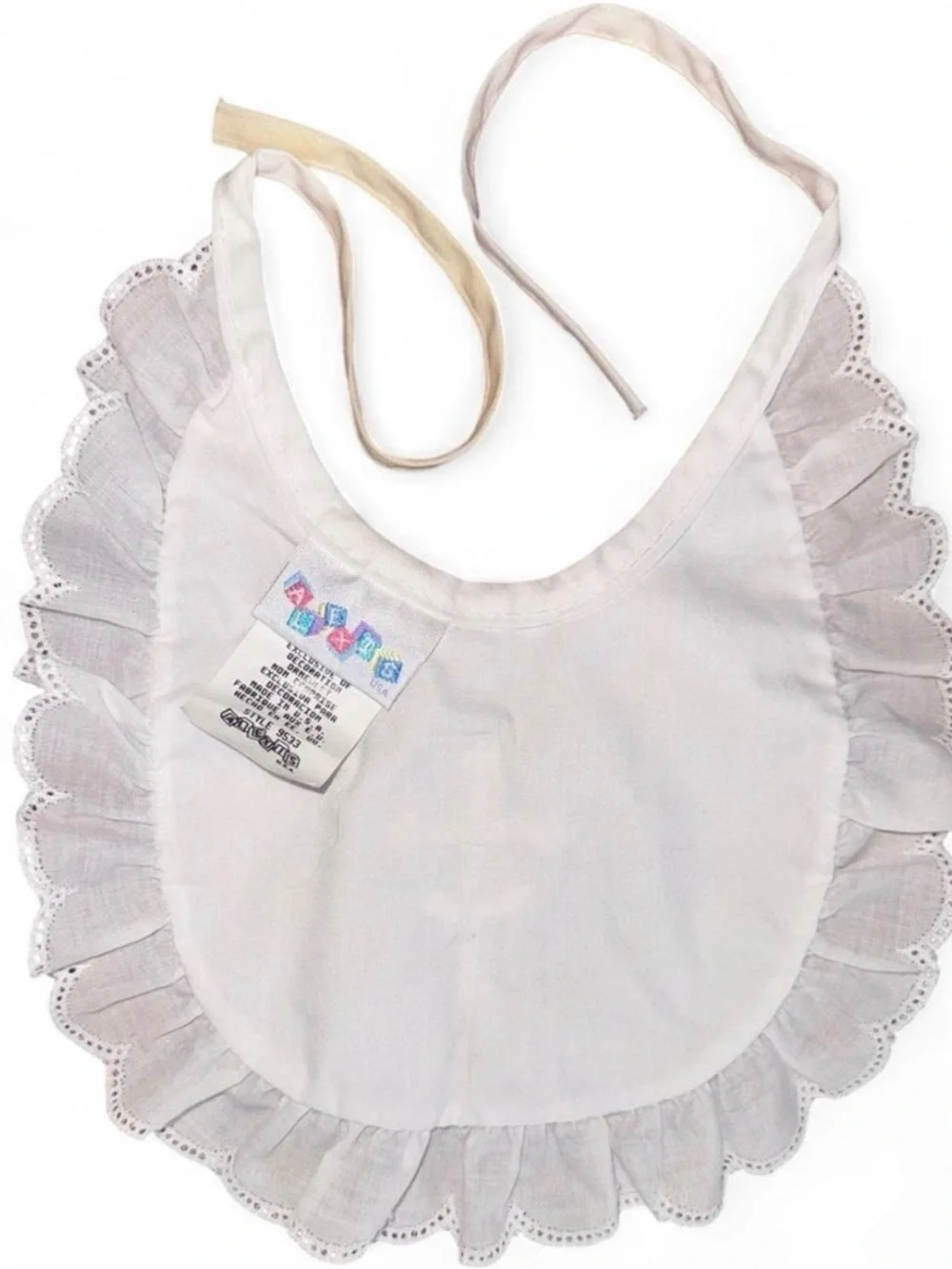 Alexis White Ruffle Bib with Cross Embroidery